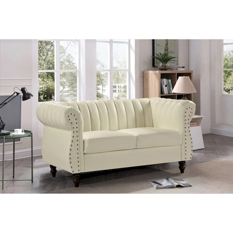 Causeuse en similicuir Capri à accoudoirs roulés et capitonnage Chesterfield