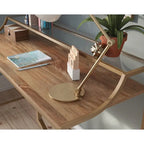 Bureau d'écriture de luxe compact avec étagère en verre, cadre doré satiné