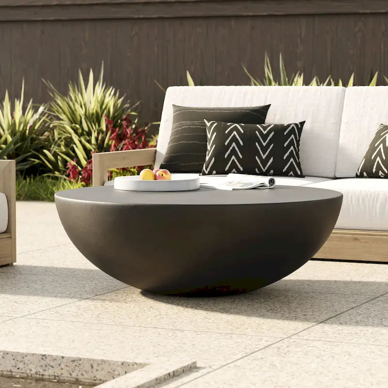 Table basse ronde en béton noir moderne avec piètement tambour