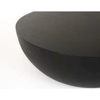 Table basse ronde en béton noir moderne avec piètement tambour
