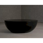 Table basse ronde en béton noir moderne avec piètement tambour